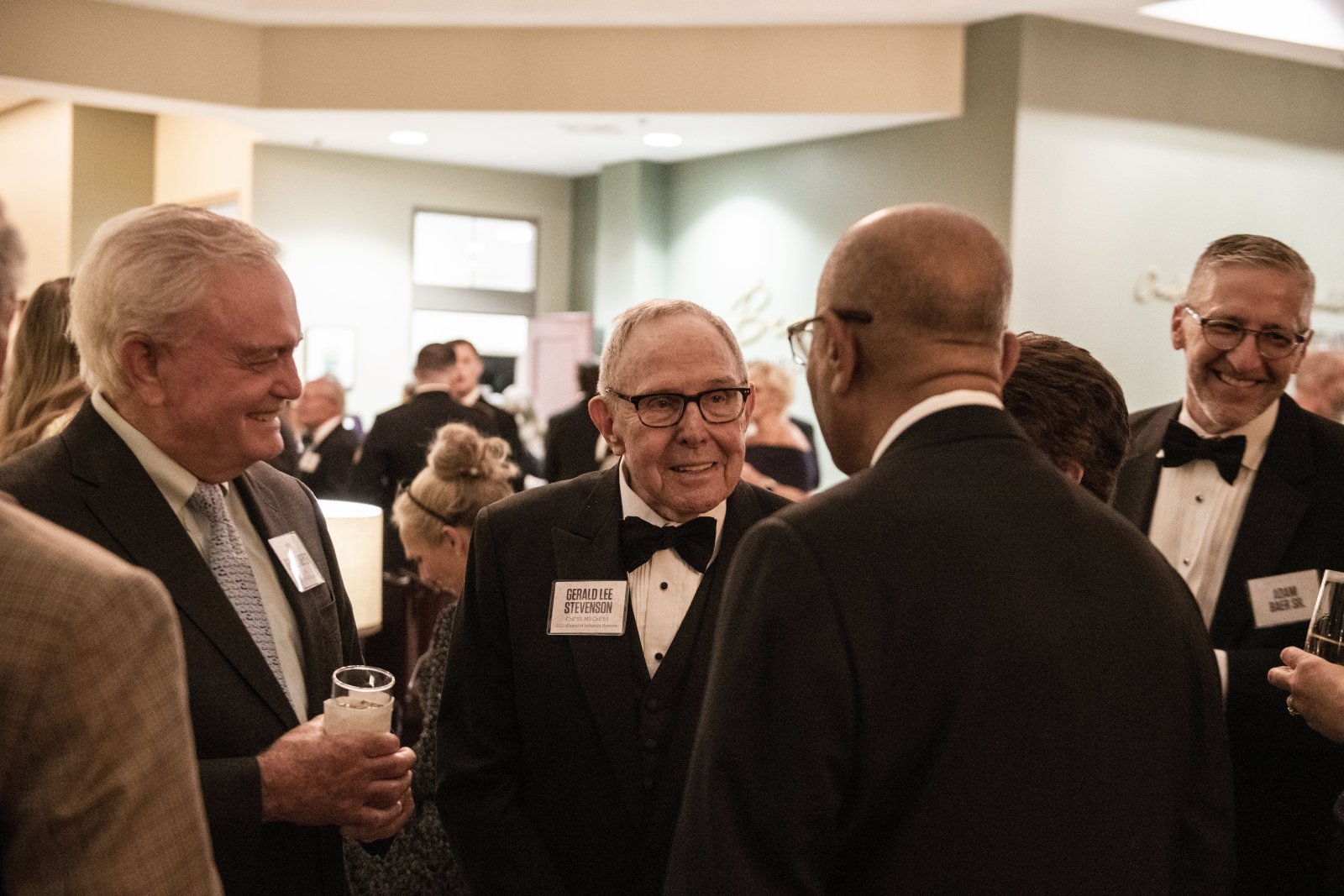 people at alumni of influence event